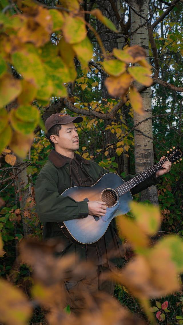 photo with foreground of leaves mitch park blah148 gibson lg-1